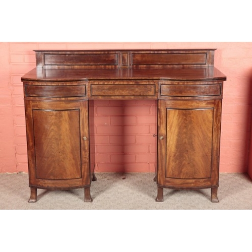 289 - A REGENCY MAHOGANY AND EBONY BANDED PEDESTAL SIDEBOARD

the top with a raised gallery over three fri... 