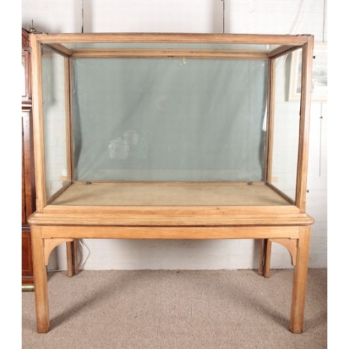 302 - A MUSEUM DISPLAY CABINET ON STAND

late 19th/early 20th century, the glazed upper section with doors... 