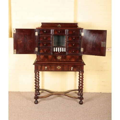 330 - A WILLIAM AND MARY OYSTER VENEERED CABINET ON STAND

basically late 17th century, the upper section ... 