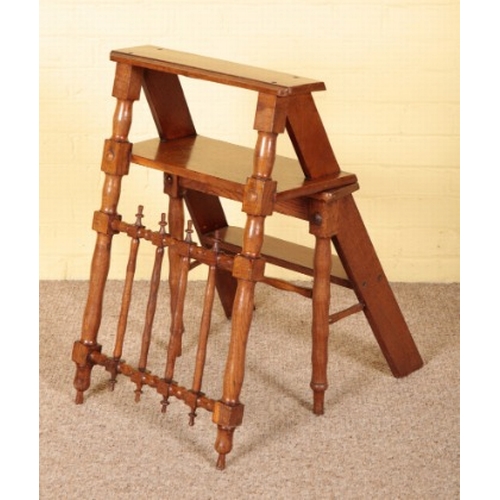 337 - AN ARTS AND CRAFTS OAK METAMORPHIC CHAIR

circa 1900, folding out to library steps, with spindle bac... 