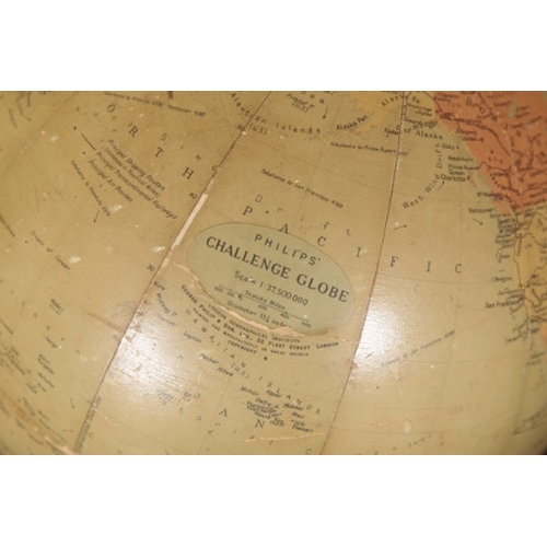 348 - A TERRESTRIAL 'CHALLENGE' GLOBE BY PHILIPS

mid 20th century, on a wooden pedestal base, 42cm high