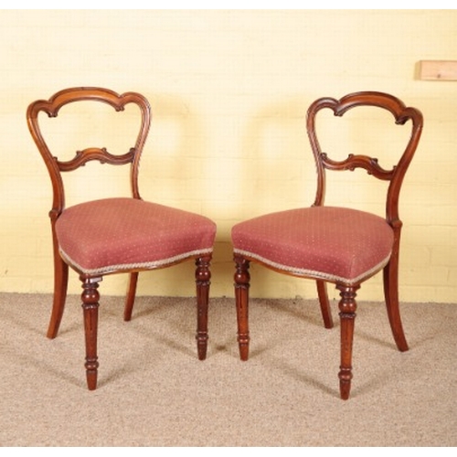 370 - A SET OF SIX VICTORIAN WALNUT BALLOON BACK DINING CHAIRS

the carved and shaped cresting rails over ... 