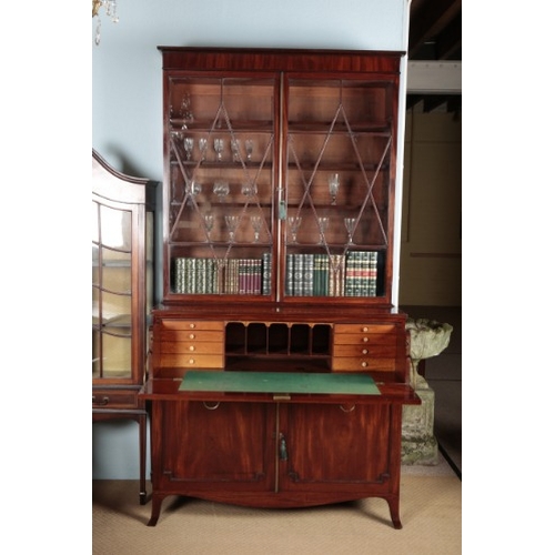 402 - A GEORGE III MAHOGANY SECRETAIRE BOOKCASE

the upper section with a moulded cornice over astragal gl... 