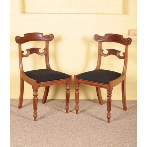 415 - A SET OF SIX WILLIAM IV MAHOGANY DINING CHAIRS

the carved and shaped bar backs over covered drop-in... 