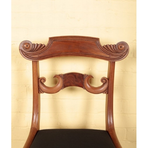 415 - A SET OF SIX WILLIAM IV MAHOGANY DINING CHAIRS

the carved and shaped bar backs over covered drop-in... 