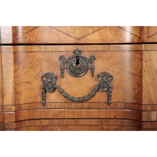 454 - A CONTINENTAL WALNUT CHEST OF DRAWERS

late 18th century, the crossbanded, boxwood and ebony stung t... 