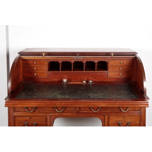 499 - A LATE VICTORIAN MAHOGANY AND EBONY STRUNG CYLINDER DESK

the tambour front lifting to reveal a slid... 