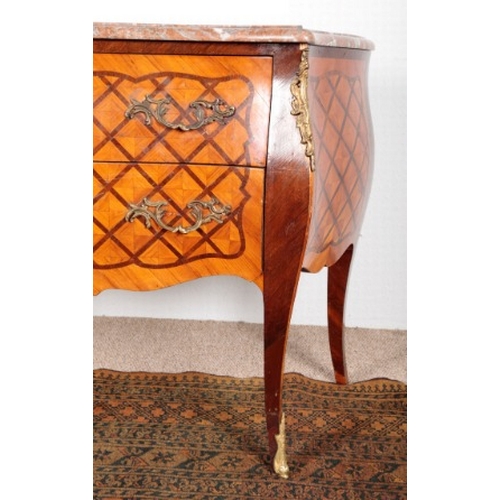 508 - A LOUIS XV STYLE PARQUETRY BOMBE COMMODE

late 19th/early 20th century, the marble top over two long... 