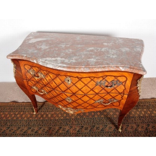 508 - A LOUIS XV STYLE PARQUETRY BOMBE COMMODE

late 19th/early 20th century, the marble top over two long... 