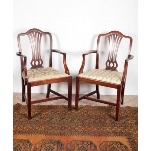 511 - A SET OF EIGHT GEORGE III  STYLE MAHOGANY DINING CHAIRS

19th century, including two armchairs, with... 