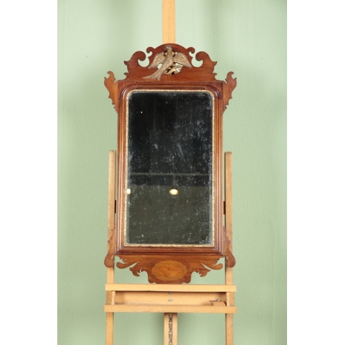 514 - A GEORGE II STYLE MAHOGANY AND PARCEL GILT PIER MIRROR

circa 1900, the bevelled plate within a carv... 