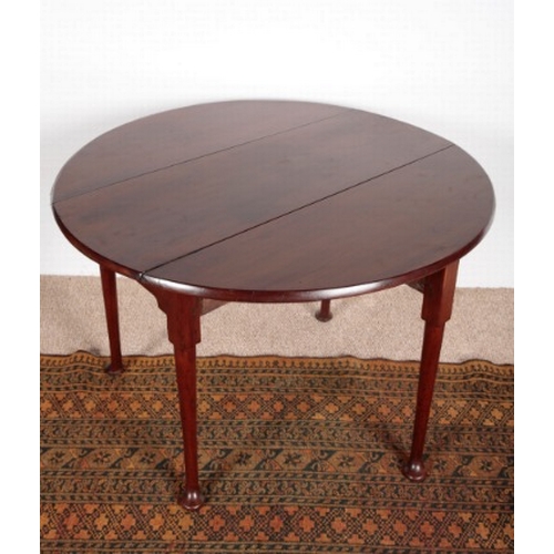 527 - A GEORGE II MAHOGANY DROP-LEAF SUPPER TABLE

the oval top on tapered legs terminating in pad feet, 7... 