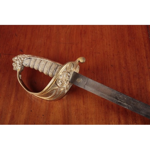 55 - A NAVAL MIDSHIPMAN SWORD

circa 1850, with etched blade, shagreen grip, lions head to top of hilt, 7... 