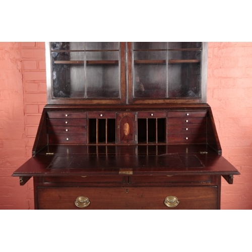 56 - A GEORGE III MAHOGANY BUREAU BOOKCASE

the upper section with a moulded cornice over astragal glazed... 