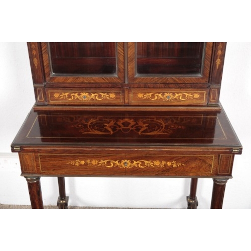 576 - A LOUIS XVI STYLE ROSEWOOD, MARQUETRY AND BRASS STRUNG BONHEUR DU JOUR BY MAPLE & CO.

the upper sec... 