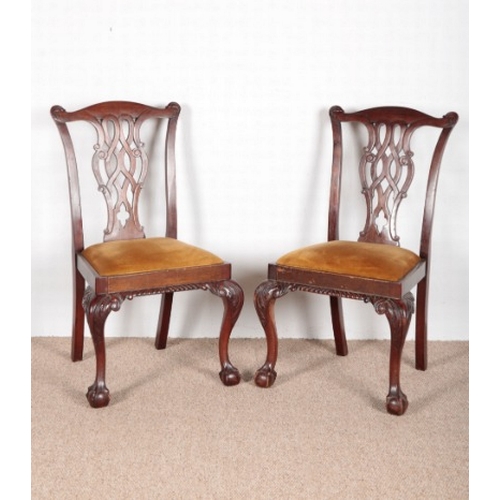 593 - A PAIR OF GEORGE III CHIPPENDALE STYLE SIDE CHAIRS

with cabriole legs on ball claw feet; together w... 