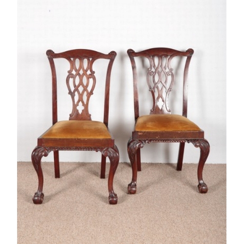 593 - A PAIR OF GEORGE III CHIPPENDALE STYLE SIDE CHAIRS

with cabriole legs on ball claw feet; together w... 