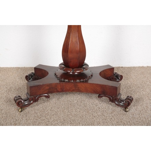 623 - A VICTORIAN MAHOGANY CONSOLE TABLE

on central column base with turned feet, 75cm high x 91cm wide