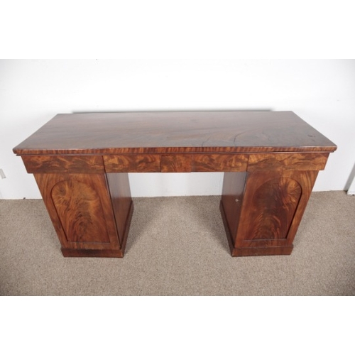 633 - A VICTORIAN FLAME MAHOGANY TWIN PEDESTAL SIDEBOARD

with two frieze drawers flanking a larger centra... 