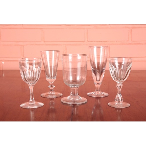 634 - A LATE 19TH CENTURY WINE GLASS

14 cm high; and four other various wine glasses (5)