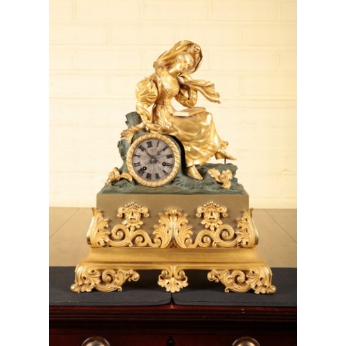 67 - A FRENCH GILT METAL MANTEL CLOCK

19th century, the two train movement striking on a bell, the silve... 