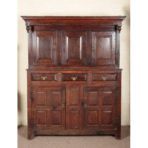 684 - A WELSH OAK COURT CUPBOARD OR DUODARN

18th century, the upper section with panelled cupboards, the ... 