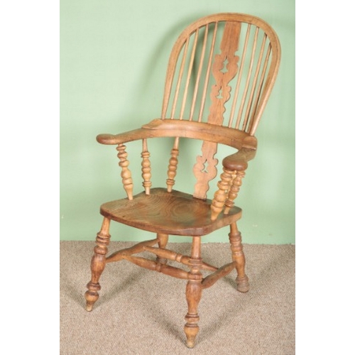 687 - AN ASH AND ELM WINDSOR ARMCHAIR

late 19th century, probably Yorkshire, with pierced back splat over... 