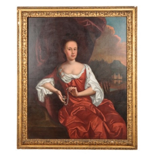 709 - A THREE QUARTER LENGTH PORTRAIT OF A NOBLEWOMAN

oil on canvas, unsigned, elegantly seated with cora... 