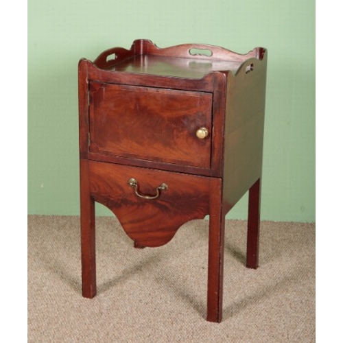 730 - A GEORGE III MAHOGANY COMMODE

with gallery top and chamfered square legs, 75cm high x 46cm wide