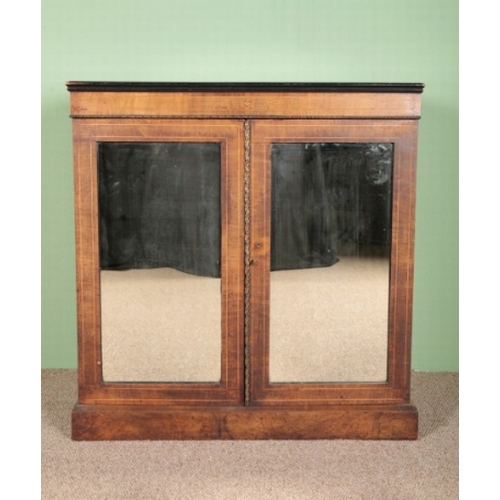 731 - A REGENCY WALNUT PIER CABINET

with mirrored doors and satinwood inlay decoration on a plinth base, ... 