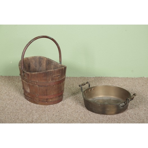 739 - AN OAK AND BRASS BOUND BUCKET

19th century, with a brass handle, 22cm high x 37cm wide; and a brass... 