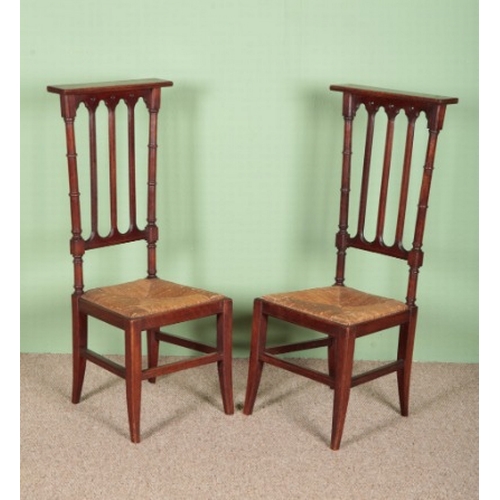 740 - A PAIR OF FRENCH OAK GOTHIC STYLE CHAIRS

19th century, with rush seats and front fluted legs, 100cm... 