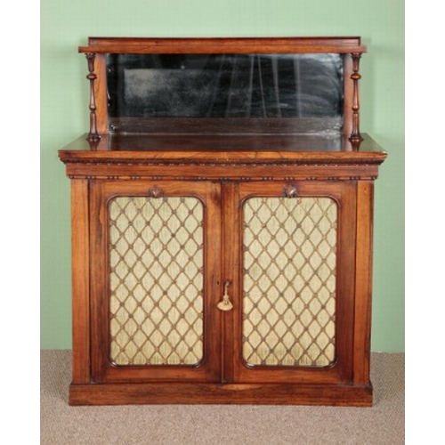 741 - A WILLIAM IV ROSEWOOD CABINET

with mirrored gallery top and gilt metal grilled doors, stamped Holla... 