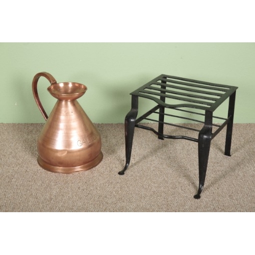 742 - A WROUGHT IRON TRIVET

19th century, with front cabriole legs 37cm x 42cm;  and a copper haystack al... 