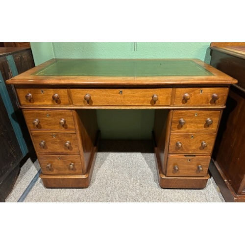 745 - A VICTORIAN MAHOGANY PEDESTAL DESK

with green tooled leather top and nine single drawers, 72cm x 10... 