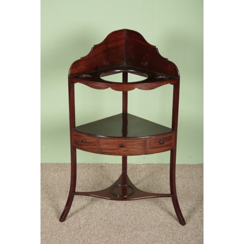 748 - A MAHOGANY CORNER WASHSTAND

19th century, with three single drawers, with a bowl and a water jug, 1... 