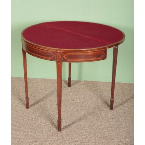 752 - A GEORGE III MAHOGANY DEMI-LUNE CARD TABLE

with satinwood inlay on square chamfered legs, 74cm high... 