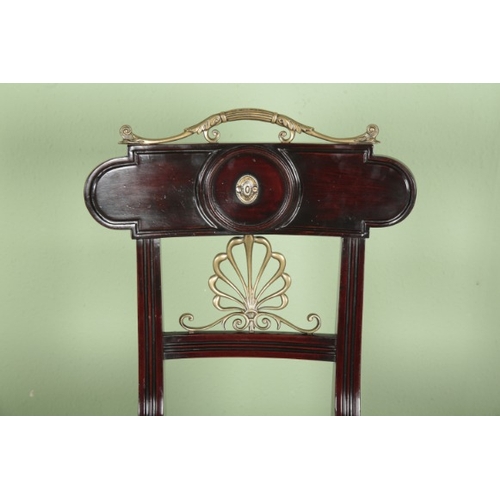 753 - A REGENCY MAHOGANY AND BRASS INLAID HALL CHAIR IN THE STYLE OF GILLOWS

with central brass anthemion... 