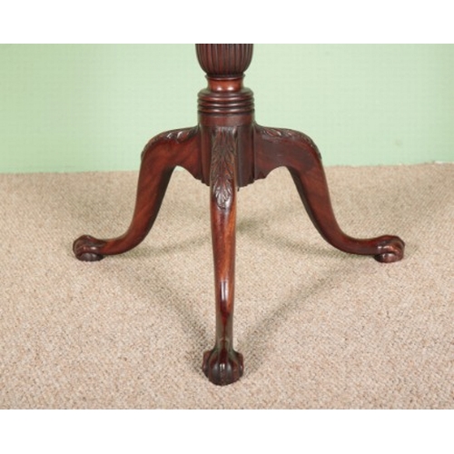 770 - A GEORGE III STYLE MAHOGANY TRIPOD TABLE

the tilt-top with pie-crust edge on a ring turned baluster... 