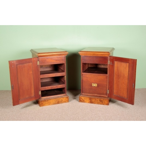 776 - A PAIR OF VICTORIAN WALNUT PEDESTAL CHESTS

each with moulded cupboard doors mounted with corbels op... 