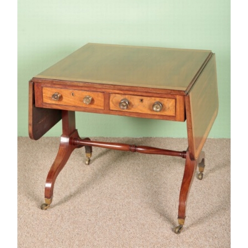 794 - A REGENCY MAHOGANY AND SATINWOOD BANDED SOFA TABLE

with two short drawers to each side, on trestle ... 