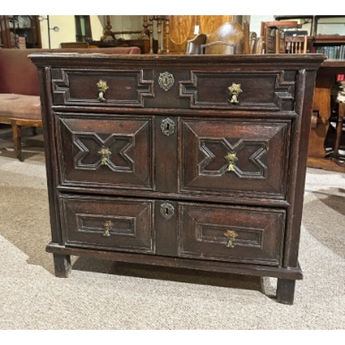 797 - AN OAK CHEST OF DRAWERS

early 17th century, with an arrangement of three drawers with geometric mou... 