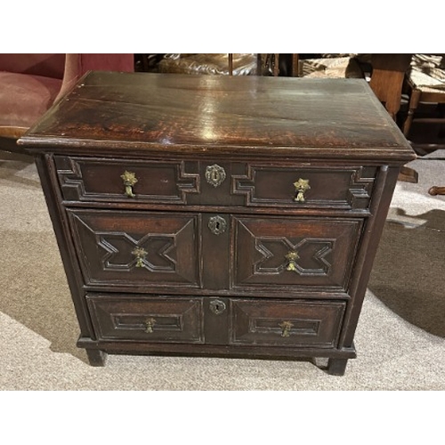 797 - AN OAK CHEST OF DRAWERS

early 17th century, with an arrangement of three drawers with geometric mou... 