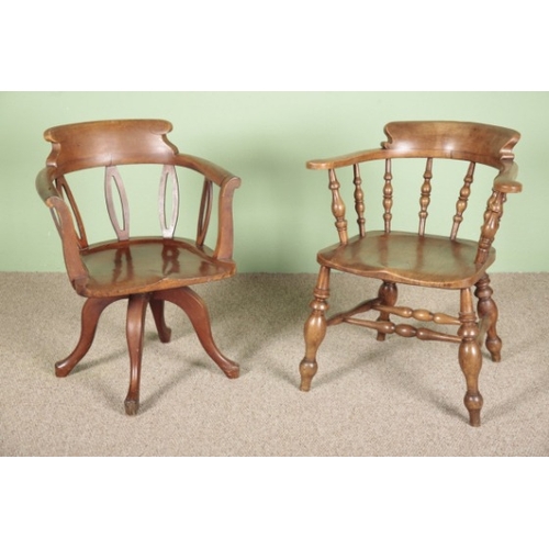 819 - A BEECH, ASH AND ELM 'SMOKER'S' ARMCHAIR

19th century, the back with turned spindles over a shaped ... 