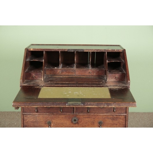 820 - A GEORGE III OAK BUREAU

mid-18th century, the fall front opening to a baize-lined writing surface a... 