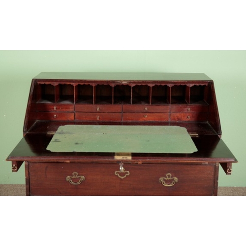 831 - A GEORGE II CUBAN MAHOGANY BUREAU

with fitted interior, two short drawers over two long drawers wit... 