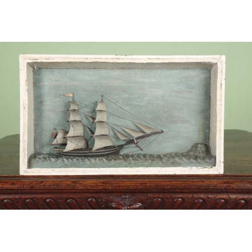 838 - A DIORAMA OF A BRITISH SCHOONER

19th century, the two masted vessel in full sail, with named pennan... 