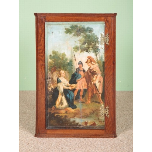 839 - A GEORGE III OAK CORNER CUPBOARD

the single door painted with a neoclassical scene depicting a sold... 