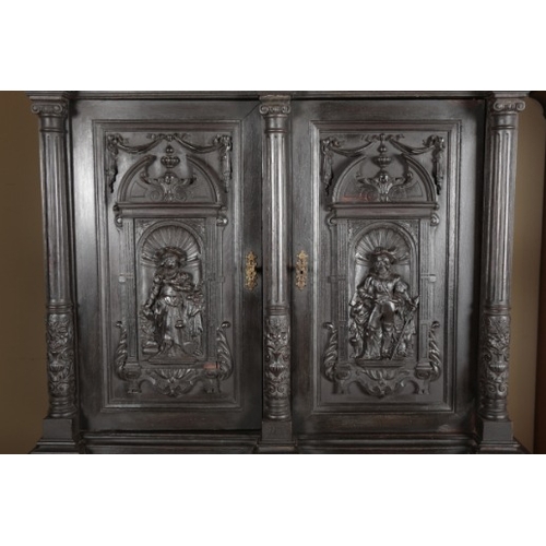 846 - A VICTORIAN GOTHIC REVIVAL EBONISED CABINET ON STAND

19th century, the upper section with a moulded... 