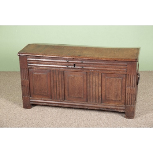 847 - A CONTINENTAL OAK COFFER

late 17th century, the domed top over a panelled front, with iron pear-sha... 